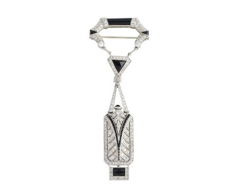 AUDEMARS PIGUET & CO: ONYX AND DIAMOND LAPEL WATCH, 1920s the rectangular dial applied with Arabic numerals, to a foliate eng