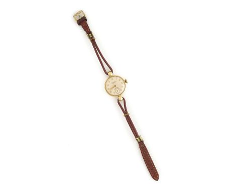 CYMA FOR J.W. BENSON LTD.: A LADY'S GOLD WRISTWATCH, SWISS, CIRCA 1954 manual wind movement signed Cyma, champagne dial with 