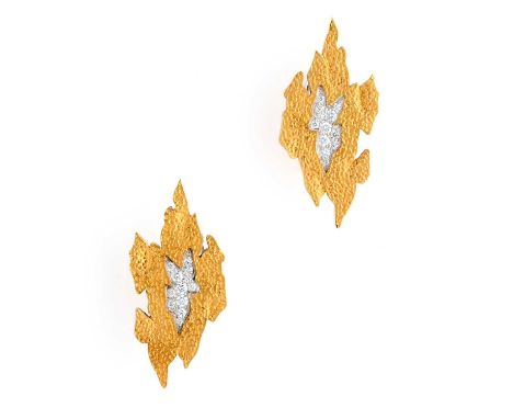 GRIMA: PAIR OF DIAMOND EAR CLIPS each designed as a textured flame shaped panel, accented to the centre with brilliant-cut di