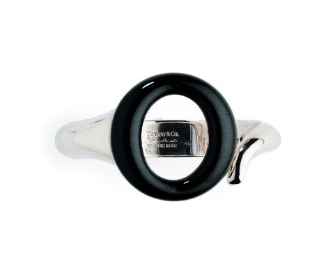 TIFFANY & CO: ELSA PERETTI, 'SEVILLANA', SILVER AND BLACK JADE BANGLE, 2011 the hinged coiled silver bangle centring on a pol