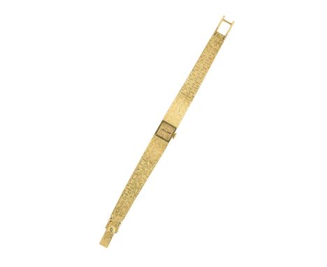 JUVENIA: A LADY'S GOLD BRACELET WATCH, SWISS, CIRCA 1970 manual wind 17 jewel movement, square gilt dial with baton indicator