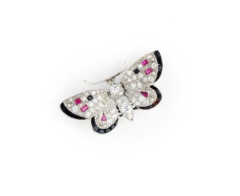 DIAMOND, ONYX AND RUBY BROOCH, 1920s designed as a butterfly, the hinged sprung wings decorated with single-cut diamonds, acc