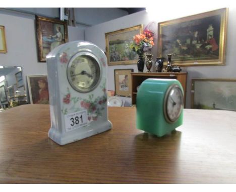 A ceramic clock and a green marble effect clock