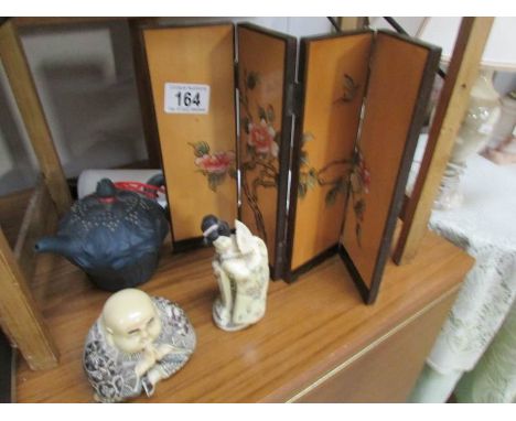 A Buddha, A Chinese lady figure, a Chinese teapot, a table screen and a scroll