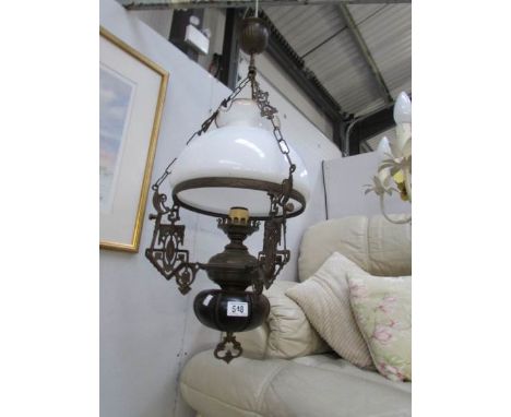 An oil lamp style ceiling light