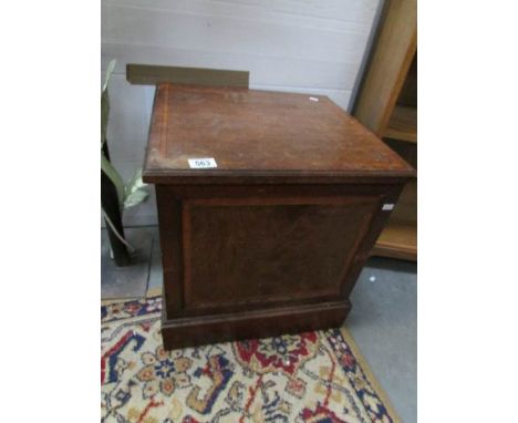 An inlaid commode