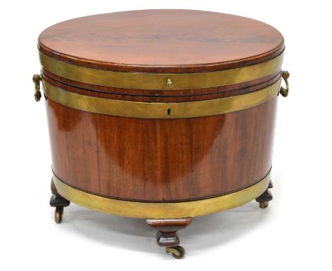 Mahogany Brass Bound Cellarette 19th century mahogany oval brass bound coopered cellarette, with cast brass carrying handles 