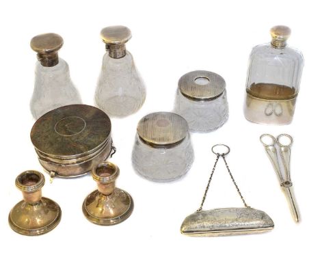 A selection of silver, A selection of silver, to include silver lidded jars, silver purse, silver candlesticks, hip flask, et