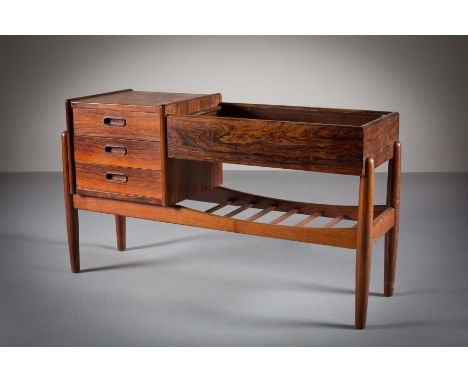 A ROSEWOOD PLANTER, DANISH 196, by Arne Wahl Iversen, with three drawers and magazine shelf, on tapering supports, 100cm (w) 