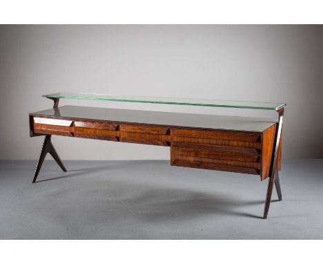 A MAHOGANY SIDEBOARD, ITALIAN 1950s, BY VITTORIO DASSI, with Murano glass shelf and top, above five frieze drawers, raised on