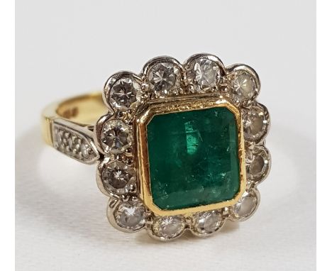 18 CARAT GOLD, DIAMOND &amp; EMERALD RING WITH CIRCA 1 CARAT OF DIAMONDS