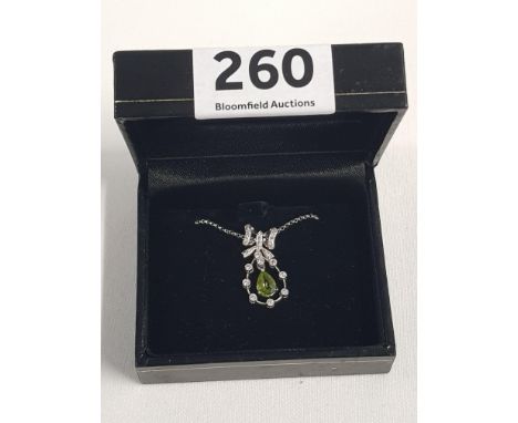 18CT GOLD DIAMOND &amp; PERIDOT PENDANT ON 18CT GOLD CHAIN