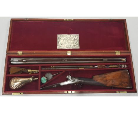 A VERY GOOD CASED PERCUSSION 19TH CENTURY 13 BORE MUZZLE LOADING SHOTGUN WITH 30' DAMASCUS BARRELLS.  THE STOCK IS WELL FIGUR