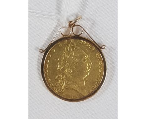 GOLD GUINEA IN 9CT GOLD MOUNT
