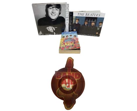 A mixed lot of vintage music memorabilia, to include: - A 1985 Band Aid shaped picture disc, the disc displays a common 'tea-