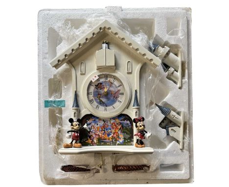 A limited edition Disney 'Happiest of Times' cuckoo clock by The Bradford Exchange, with certificate and within original pack