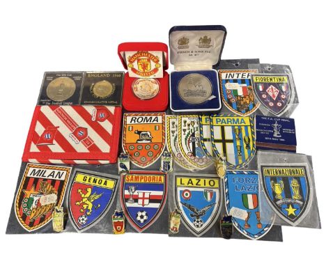 A collection of various commemorative football coins and collectables, to include: - England 1966 medal - Manchester United '