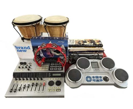 A mixed lot of musical instruments and accessories, to include: - A 200M HD8 H/D recodring studio - DD304 Drum Machine - A bo