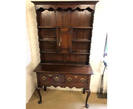Antique furniture, 19th century oak dresser, on cabriolet legs, two drawer base with three shelf top and central cupboard, ap