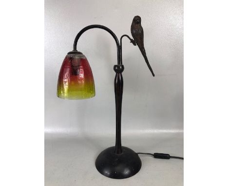 Vintage table lamp of art deco style, patinated metal base with twin branches, one with the light fitting and crackle glass s