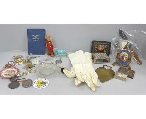 A brass and enamel easel with devotional plaque, small framed Holy relic, 5 Franc coin brooch, a/f and other items