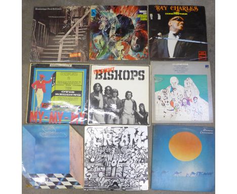 A box of rock and pop LP records, including Cream, Traffic, Santana, Bob Dylan, Thompson Twins, Van Morrison, etc.