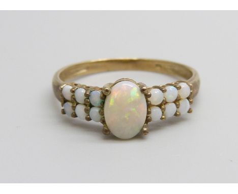 A 9ct gold and opal ring, 1.6g, P