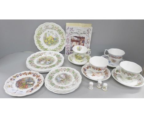 A collection of Royal Doulton Brambly Hedge including a set of Four Seasons cups and saucers and three thimbles 