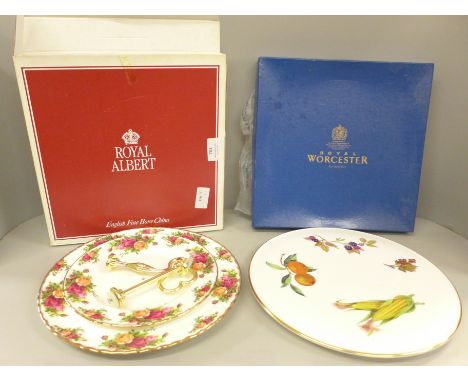 A Royal Albert Old Country Roses two tier cake stand and a Royal Worcester plate, both boxed