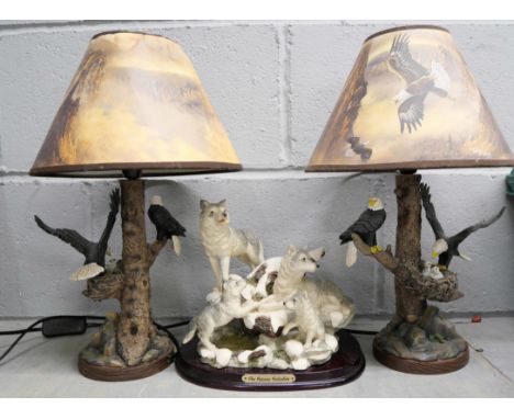 A pair of Bradford Exchange Treetop Majesty table lamps, Eagle Wall clock and a Juliana Collection figure group of wolves **P