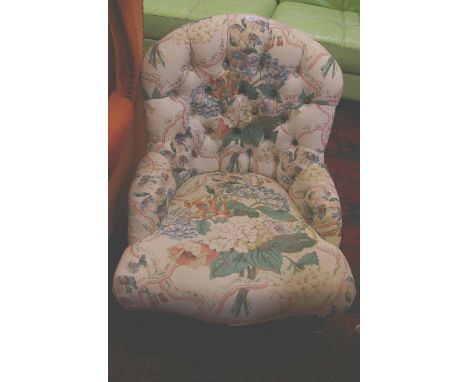 A Victorian style button back nursing chair, with floral upholstery.Property of the owners of the Downton Estate, Shropshire