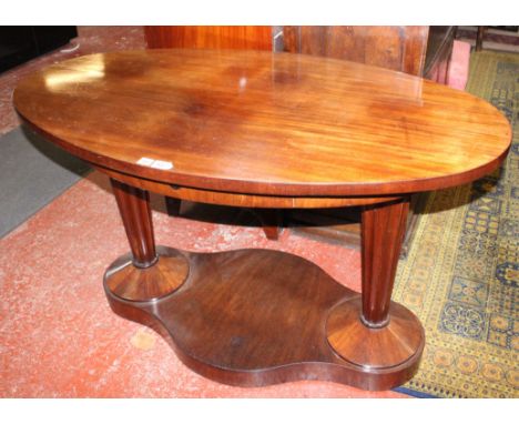 A Continental Art Deco mahogany hall table, first half 20th Century 78cm high, 134cm wide 