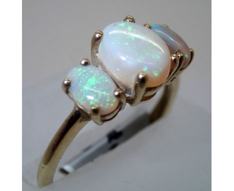 Ladies 9ct gold three stone opal ring size N. P&amp;P group 1 (£16 for the first item and £1.50 for subsequent items) 