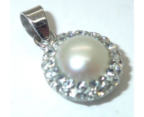 Fancy sterling silver and real pearl pendant. P&amp;P group 1 (£16 for the first item and £1.50 for subsequent items) 