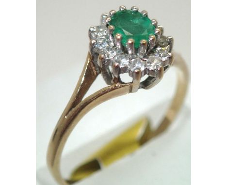 9ct gold, emerald and diamond cluster ring size M/N. P&amp;P group 1 (£16 for the first item and £1.50 for subsequent items) 