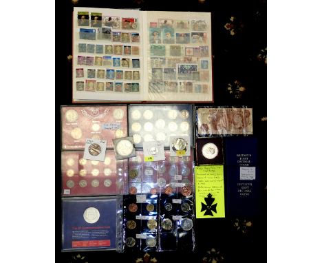 Mixed UK and world coins and a stamp album. P&amp;P group 2 (£20 for the first item and £2.50 for subsequent items) 