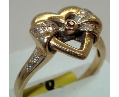 14ct gold fancy heart, ruby and diamond ring size O 4.6g. P&P group 1 (£16 for the first item and £1.50 for subsequent items)
