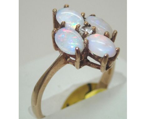 Ladies 9ct gold opal and diamond ring 5.6g. P&amp;P group 1 (£16 for the first item and £1.50 for subsequent items) 