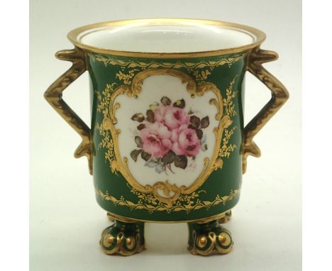 Royal Crown Derby four footed twin handled spill holder, having floral painted panels against a green ground, H: 8.5 cm. P&P 