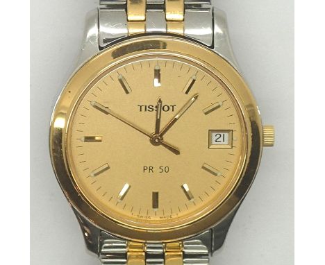 Tissot two tone quartz wristwatch. P&amp;P group 1 (£16 for the first item and £1.50 for subsequent items) 