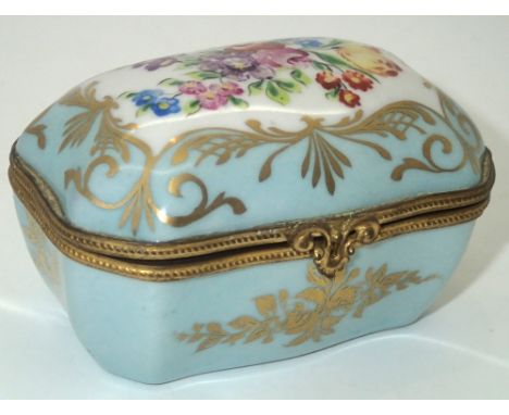 19thC French porcelain pot with hinged cover, inscribed  Paris, France, L: 8.5 cm. P&P group 1 (£16 for the first item and £1