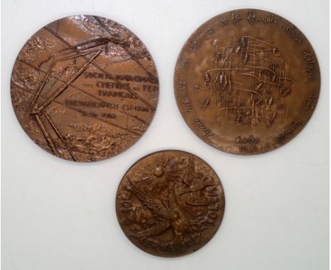 Three bronze French table medals, largest D: 66mm.  P&amp;P group 1 (£16 for the first item and £1.50 for subsequent items) 