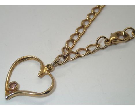 Gold plated charm bracelet. P&amp;P group 1 (£16 for the first item and £1.50 for subsequent items) 