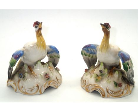 Pair of ceramic birds of paradise, each having gold anchor mark to the base. H: 9 cm. P&P group 1 (£16 for the first item and