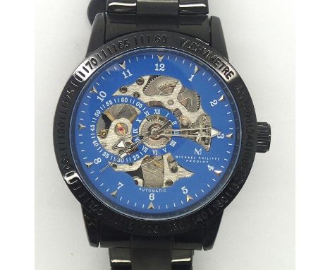 New old stock Michael Phillippe boxed skeleton wristwatch on a ceramic bracelet. P&amp;P group 1 (£16 for the first item and 