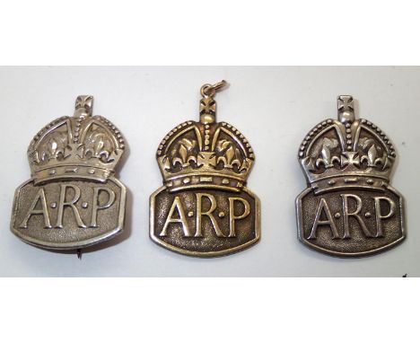 Three hallmarked silver ARP badges, pin, button and pendant. P&amp;P group 1 (£16 for the first item and £1.50 for subsequent