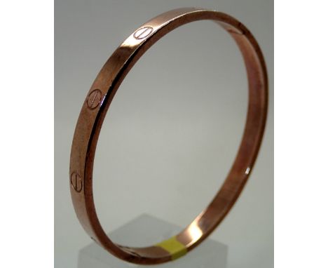 Cartier type hinged suave bangle. P&amp;P group 1 (£16 for the first item and £1.50 for subsequent items) 