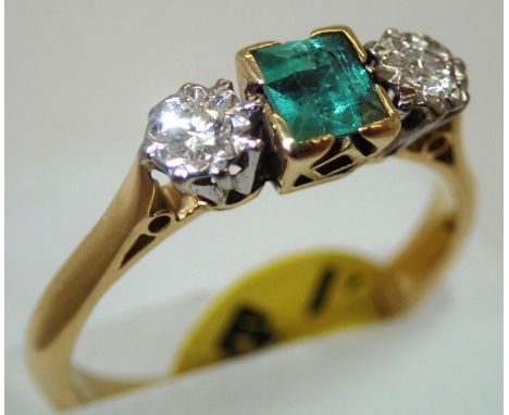 Ladies 18ct gold three stone emerald and diamond ring, 3.6g, emerald measures 4.4 mm square, D: approximately 2.5 mm. P&P gro