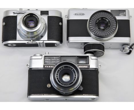 Collection of vintage 35mm cameras, Voigtlander Vito B 35mm, Yashica Minister 35mm Rangefinder, Fujica Rapid D1 Clockwork Hal