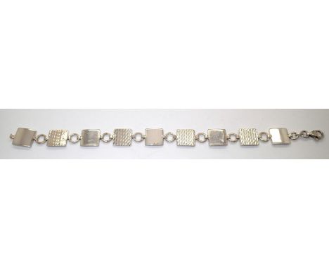 Silver fancy square link bracelet. P&amp;P group 1 (£16 for the first item and £1.50 for subsequent items) 